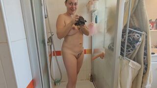 Busty milf getting ready in the shower with her dildo - 10 image