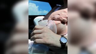 Pumping my Big Milk Tits Empty in the Car - 2 image