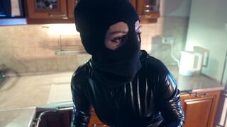 The policeman caught the robber in the apartment