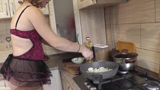 Mommy MILF without panties in stockings high heels continues nude cooking, shows pussy, boobs, nipples, butt and cooks pasta nautically  in kitchen. Ass pussy tits legs mom MILF - 5 image