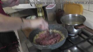 Mommy MILF without panties in stockings high heels continues nude cooking, shows pussy, boobs, nipples, butt and cooks pasta nautically  in kitchen. Ass pussy tits legs mom MILF - 8 image