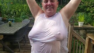 Tarablee Hotz- cooling off in the rain on a hot day. My wet t-shirt barely conceals my big tits. - 10 image