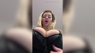 Big natural tits bursting out elastic leather