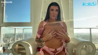 Watch Romi Rain's massive knockers bounce as she rubs her pussy to orgasm