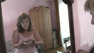 Konstanzia's solo play: Sexy MILF fingers her shaved pussy, has strong orgasm, and squirts like a fountain - 1 image