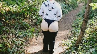 Exhibitionist MILF Flashing her round Booty and Playing with her Pussy at a Public Park - 1 image