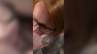 Hot redhead wearing glasses gets a facial - 15 image